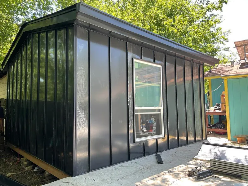 Black standing seam metal wall panels for Metal Roof Installation in Anadarko